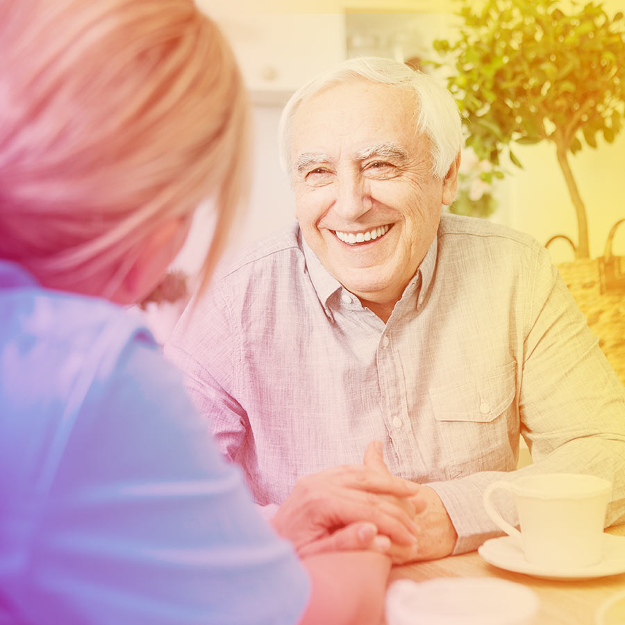 older patient with doctor at home